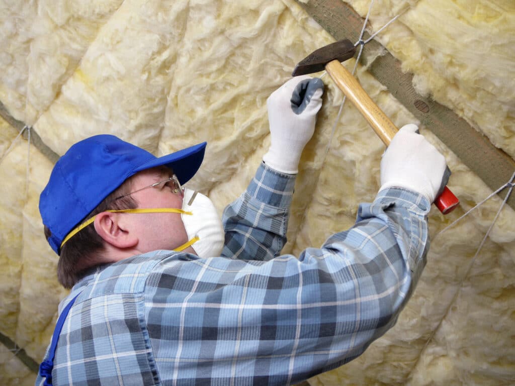 unfaced insulation being secured